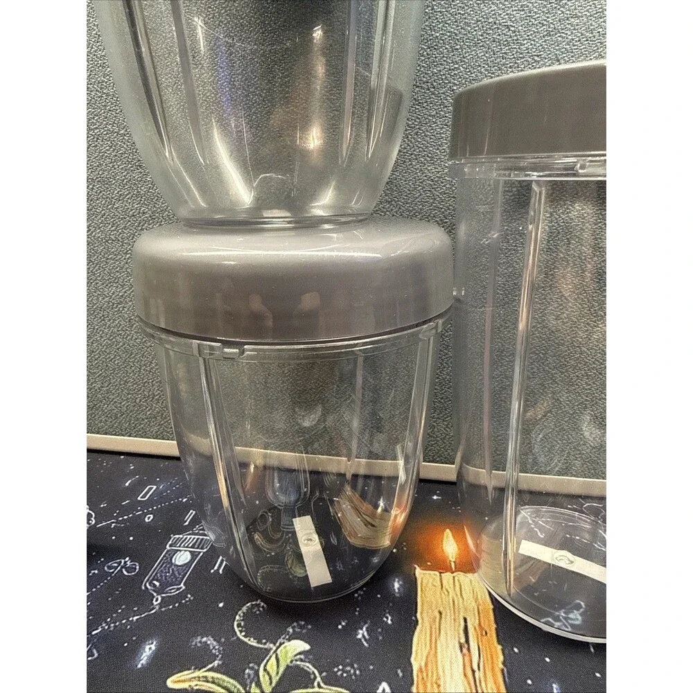 Nutribullet Lot Of 4 Replacement Cups With Lids